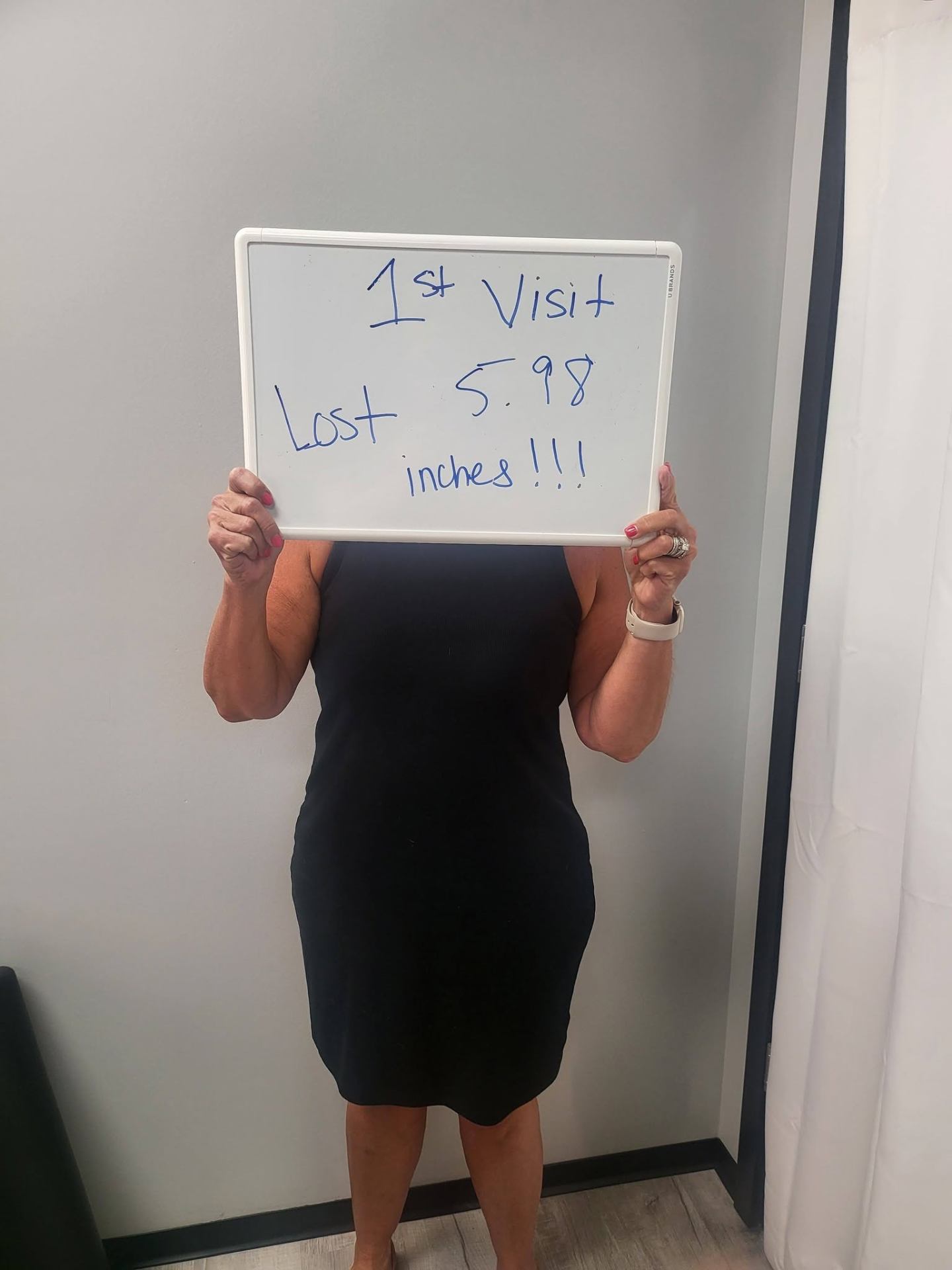 Contour Light client holding a whiteboard: 5.98 inches — Lost on her first visit